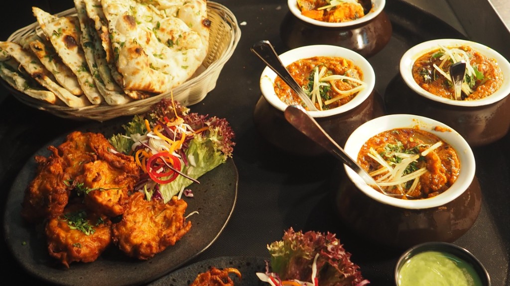 Curries served with fresh naan bread